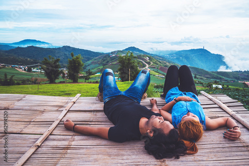 Lover Men and women Asia travel relax. Morning atmosphere nature Forests, mountains. Phu Thap Buek Thailand photo