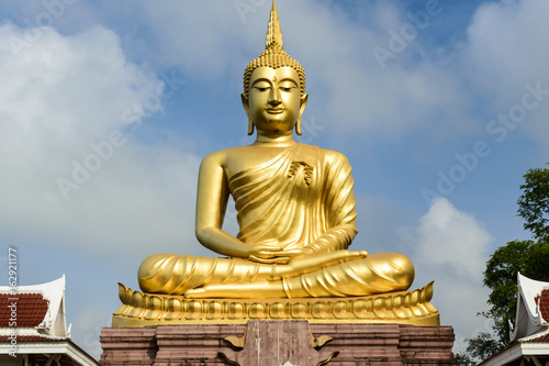 Buddha statue in Buddhist  temple or wat, is public domain or treasure of Buddhism. (Shot at outdoor ,public area)