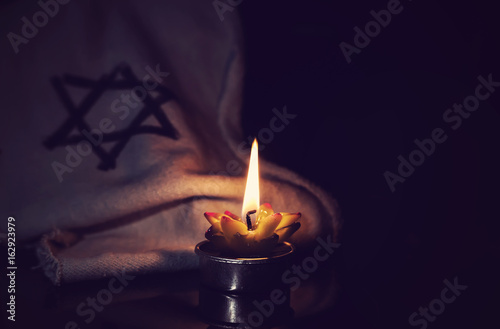 Bild auf Leinwand The star of David and candle stands