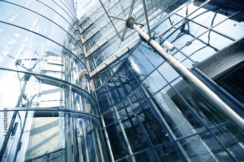 Office building detail low angle view  steel structure and glass roof photographed from below