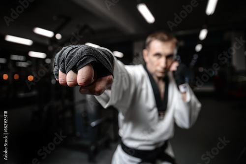 Martial arts fighters in gym