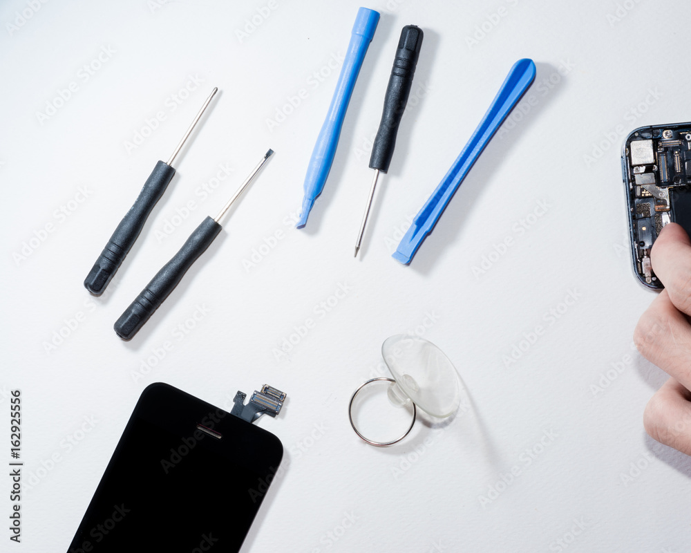 Toolings for repair the smartphone that stand isolated on white background.(tools) Toolings for repair the smartphone that stand isolated on white background.(tools)