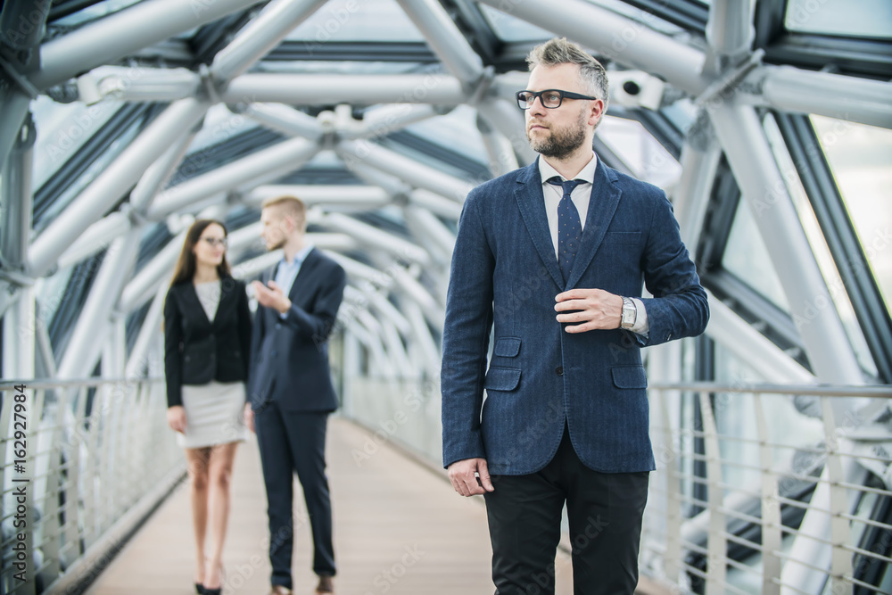 a successful businessman in the business center a successful businessman in the business center