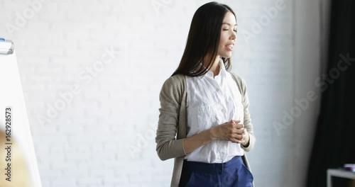 Asian Businesswoman Speaker On Presentation With Group Of Business People Asking Questions During Conference Meeting Training Seminar Slow Motion 60