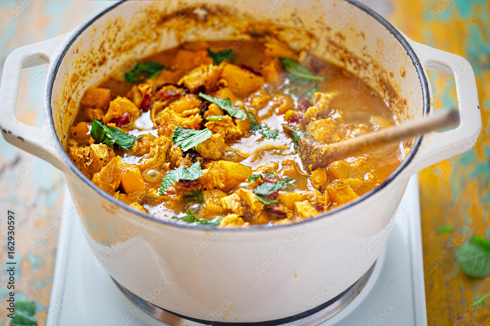 Moroccan tajine - fried chicken with pumpkin cranberries, feta and mint Moroccan tajine - fried chicken with pumpkin cranberries, feta and mint