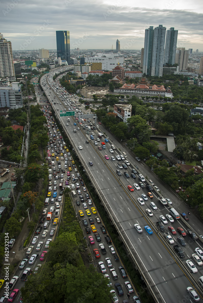 Aerial view panoramic of Expressway road in Bangkok city, traffic jam on rush hour period.