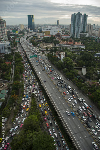 Aerial view panoramic of Expressway road in Bangkok city, traffic jam on rush hour period. © orapin