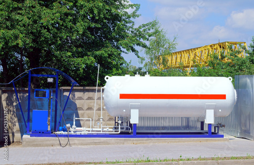 Obraz na płótnie LPG station for filling liquefied gas into the vehicle tanks. Environmentally friendly fuel. w salonie