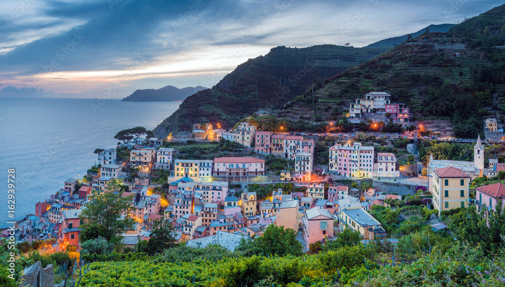 Beautiful evening panoramic view of Riomaggiore in Cinque Terre, Liguria, Italy, Europe.