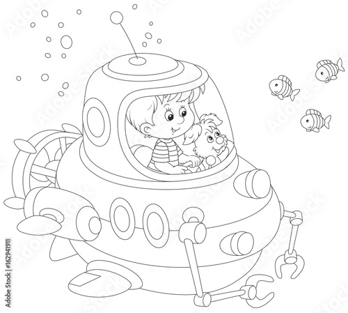 Toy deep-sea bathyscaphe piloting by a little boy with his pup