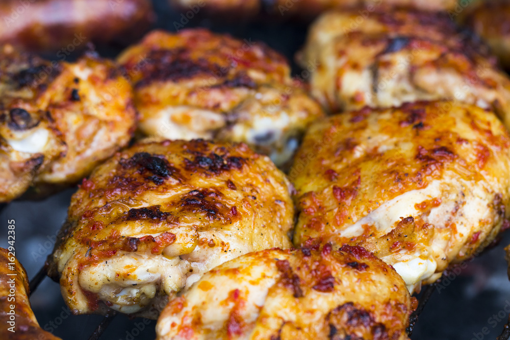 Chicken Sausages being grilled on an outdoor barbecue for that Special Smokey Outdoor Taste Chicken Sausages being grilled on an outdoor barbecue for that Special Smokey Outdoor Taste