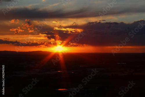 Panoramatic view on city Ceske Budejovice in sunset with sun