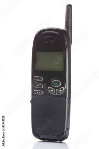 Old mobile phone isolated on white background