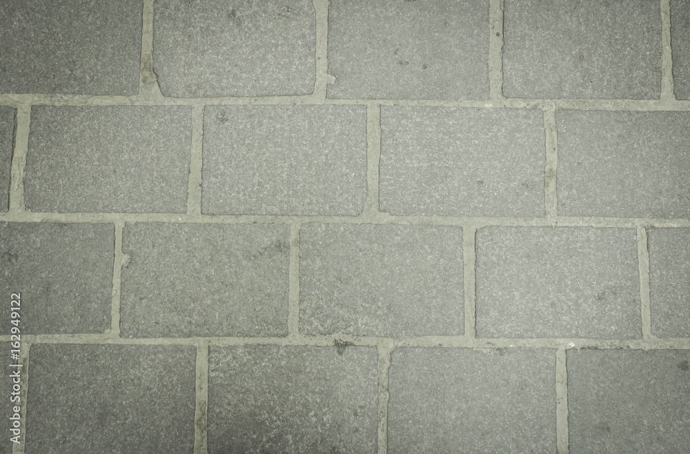 Naklejka premium Texture of street tiles