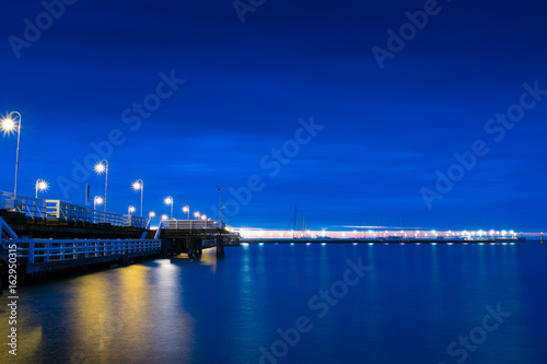 Sopot jetty at nigh - side view. Pomerania, Poland.