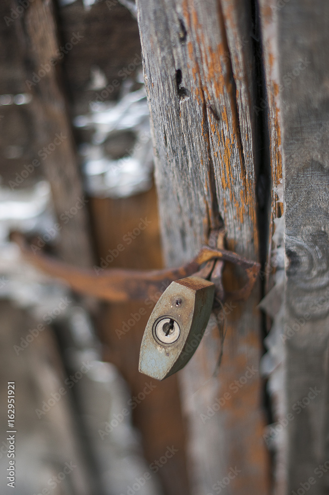 Old rusty padlock on gate Old rusty padlock on gate