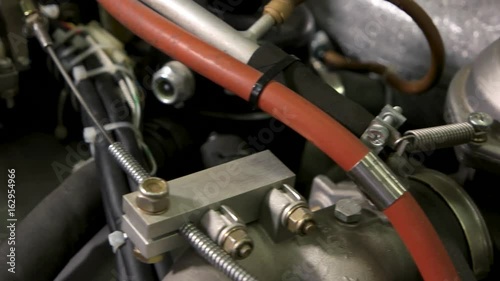 Wallpaper Mural Engine close up. Steel parts and hoses. Diesel fuel facts. Torontodigital.ca