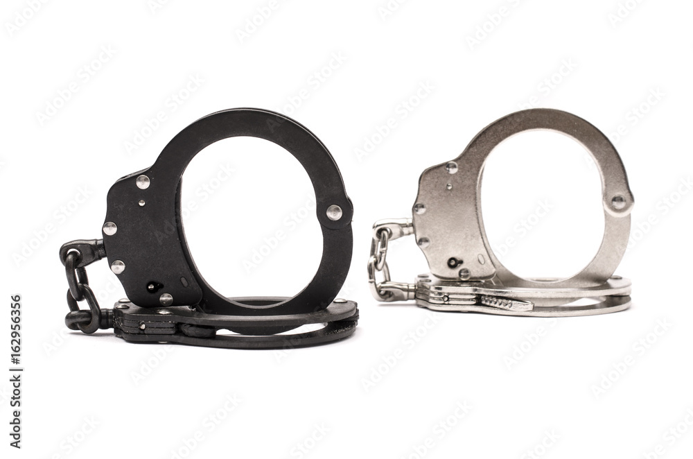 Obraz premium Pair of handcuffs isolated