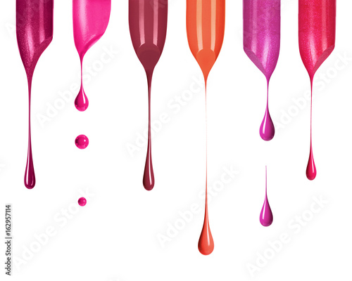 Melting colored lipsticks with falling drops down isolated on white background