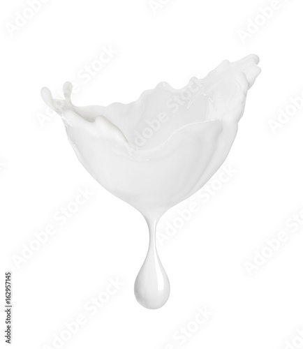Splash of milk or cream with drop  isolated on white background