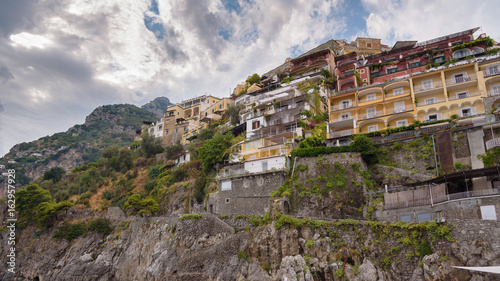 Buildings on a cliff in Positano town in Italy