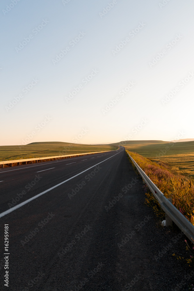 Highway. Open views and sunny weather to travel. Highway. Open views and sunny weather to travel.