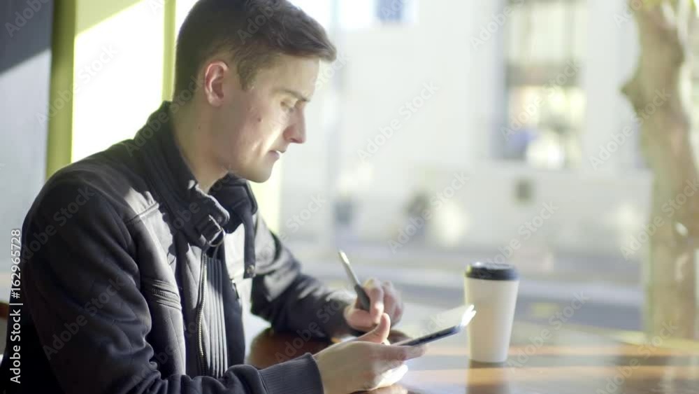 Man Draws San Francisco On His Tablet (Outside Coffee Shop Window) Man Draws San Francisco On His Tablet (Outside Coffee Shop Window)