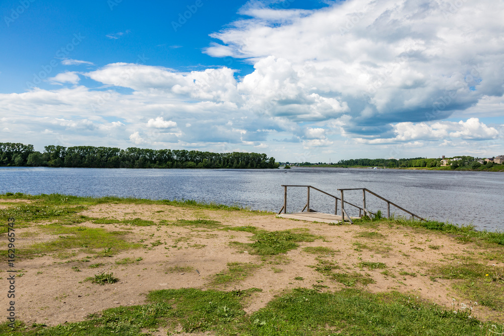 The shore of the grandiose Russian Volga river near the town of Uglich on a summer day. Yaroslavl region
