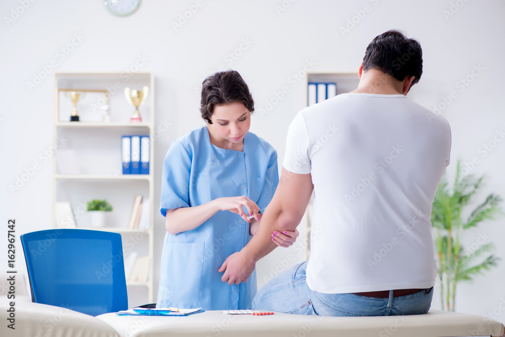 Fototapeta premium Man visiting female doctor in medical concept