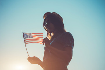 Woman holding USA flag
