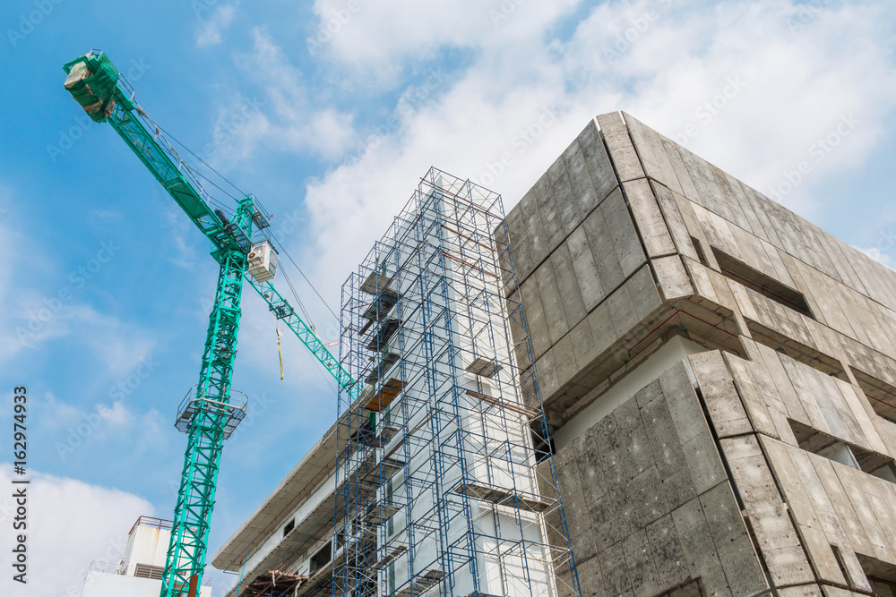 Fototapeta premium construction site and crane with blue sky