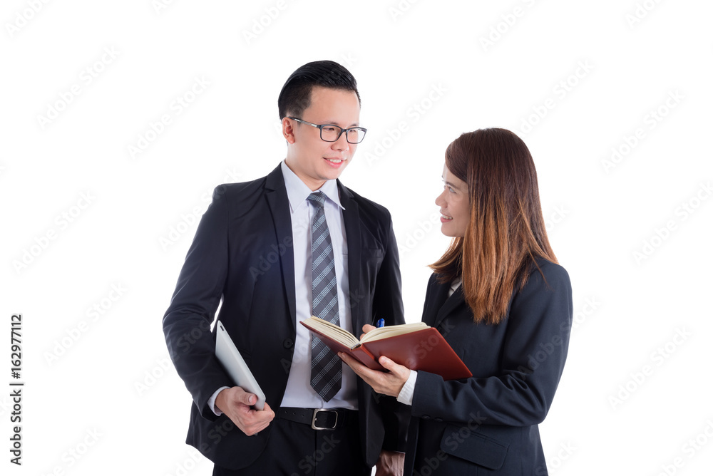 Asian businesspeople discussing about work over white background Asian businesspeople discussing about work over white background