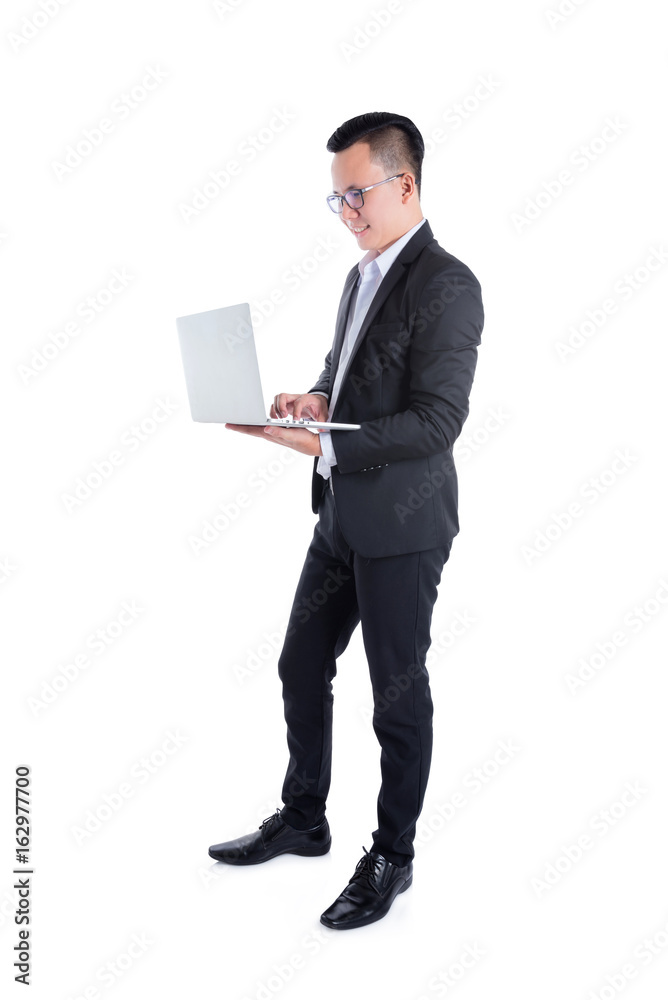 Young asian businessman using laptop computer over white background