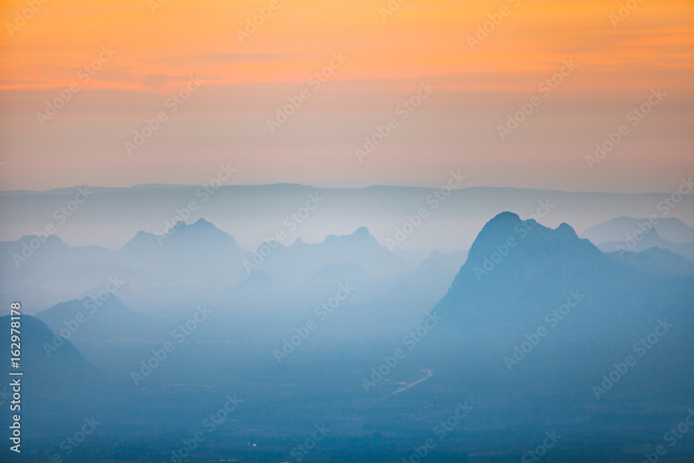 Morning light with mountain and mist view from Phu Kradueng, Thailand.