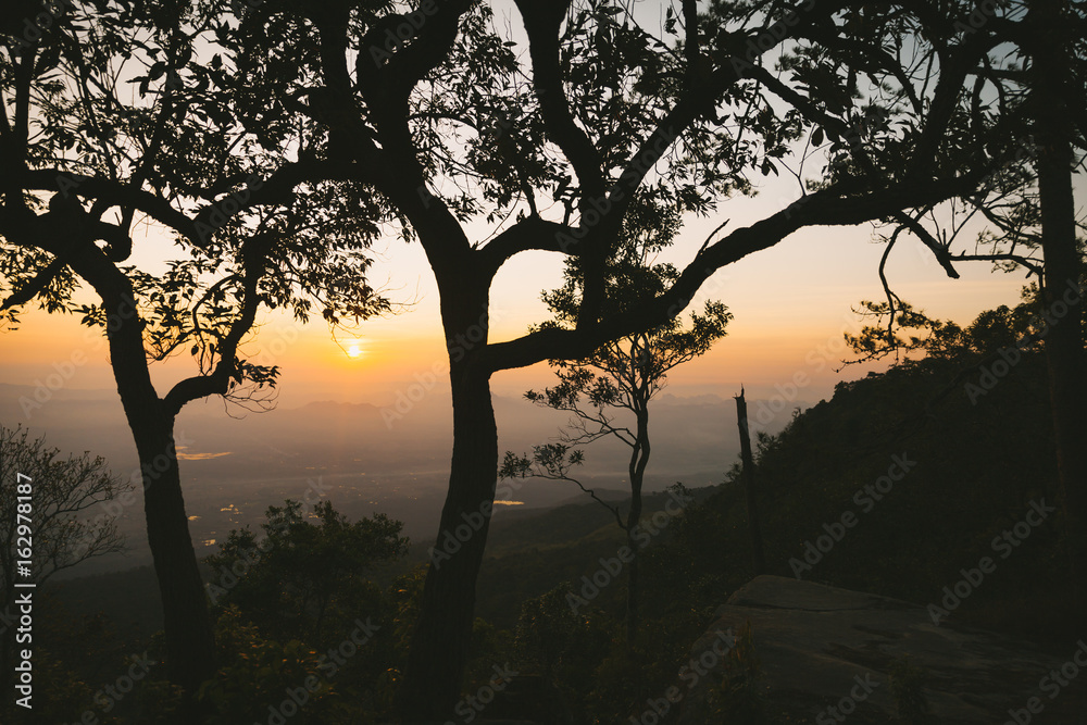 The sunrise scene with forest and mountain in Phu Kradueng National Park, Thailand. The sunrise scene with forest and mountain in Phu Kradueng National Park, Thailand.