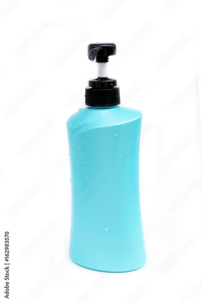Blue Plastic Bottle Of Shampoo Isolated On White Background. Blue Plastic Bottle Of Shampoo Isolated On White Background.