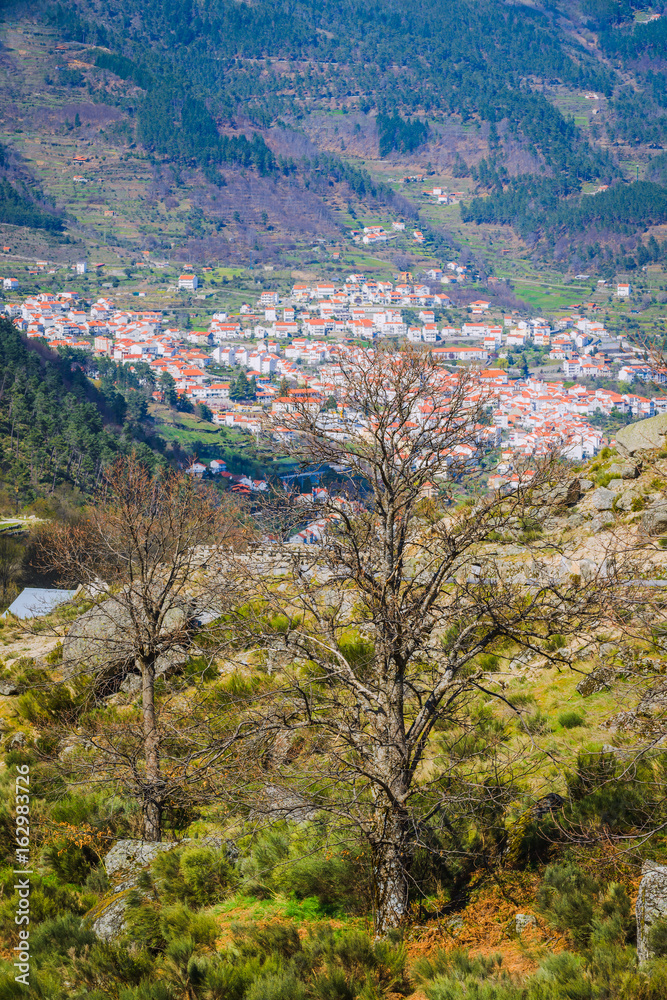 View of the village of Manteigas in the glacial valley of the Zezere river. Serra da Estrela mountains. County of Guarda. Portugal