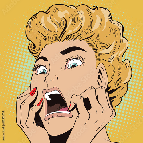 Young beautiful woman screams on fear.