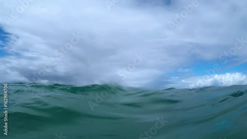 POV Shot Of Gentle Waves Rolling Over Camera In Open Water, Maui, Hawaii