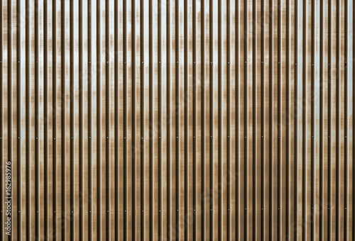Fototapeta Naklejka Na Ścianę i Meble -  Old rusty corrugated metal wall of a barn building