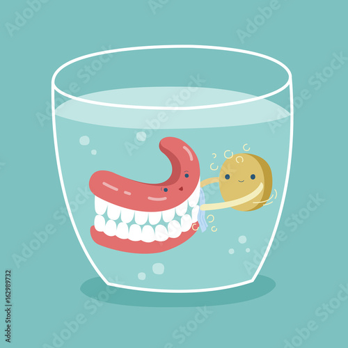 Cleaning the denture ,teeth and tooth concept of dental