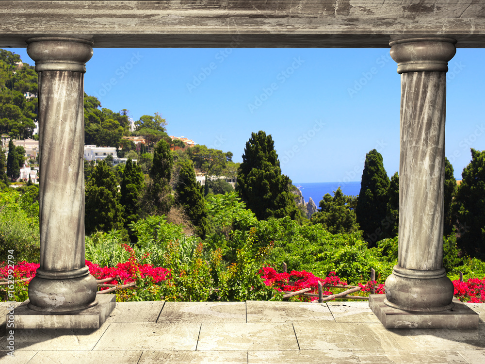 Columns and top view on landscape of Capri island, Italy