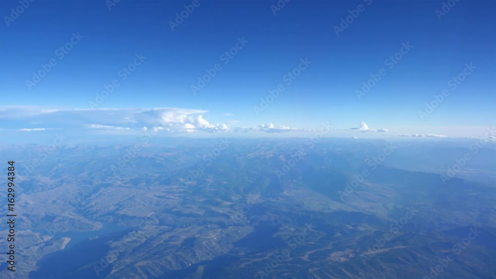 Aerial shot above the clouds of mountains in 4K Aerial shot above the clouds of mountains in 4K