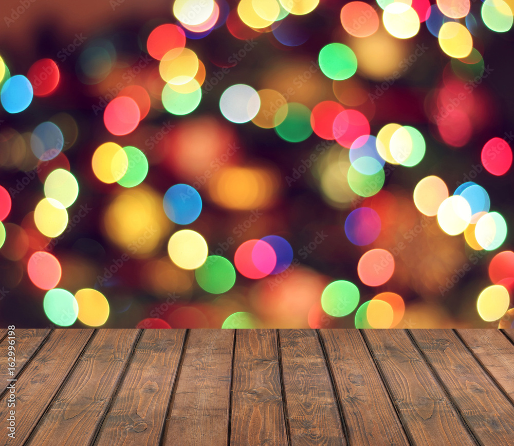 Empty wooden deck on blurred background with bokeh. Empty wooden deck on blurred background with bokeh.