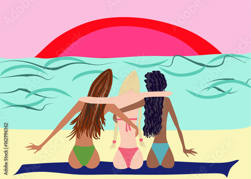 Three women on vacation, sitting in swimsuit on the beach in an embrace and admiring the sunset.