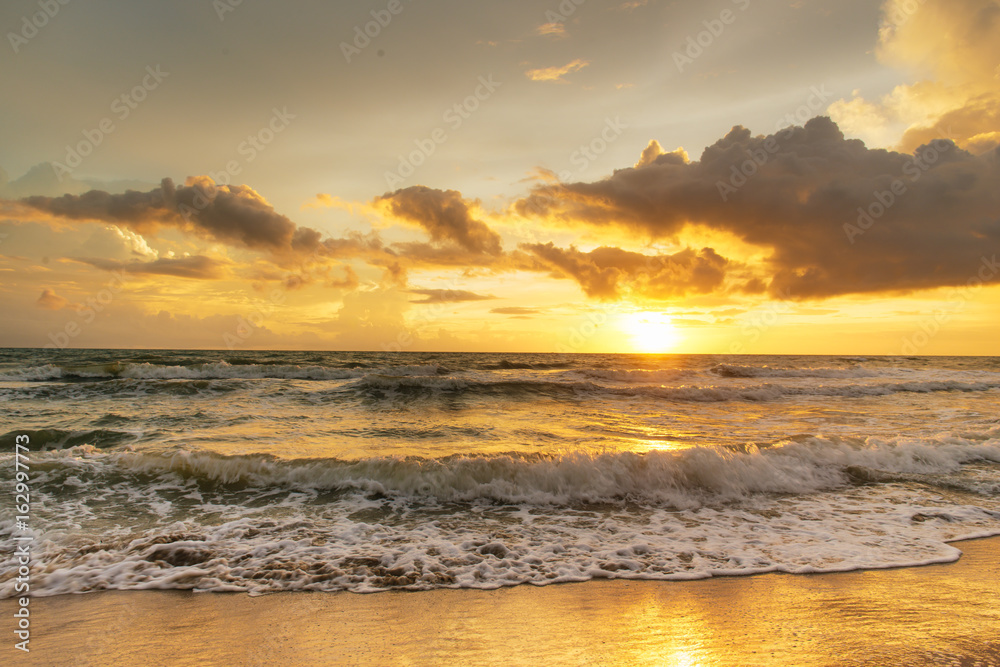 Fototapeta premium Sunset. Beautiful sunset at baltic sea. Gold sea sunset.