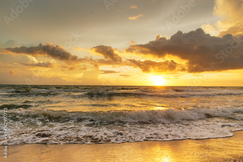 Fototapeta Naklejka Na Ścianę i Meble -  Sunset. Beautiful sunset at baltic sea. Gold sea sunset.