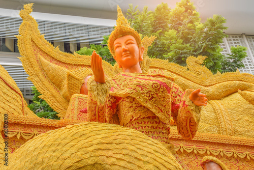 The wax festival,Traditionally Lent Candle Festival,Khao Phansa day at Ubon Ratchathani province Thailand.The public properties in Thailand.By the beam light and lens flare effect tone. photo