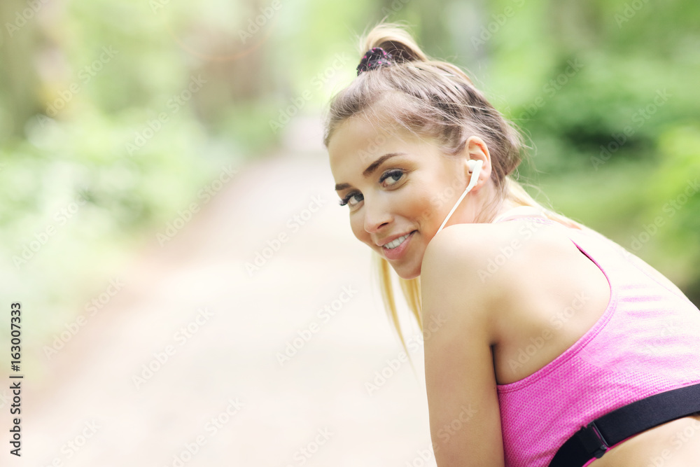 Woman jogging in the forest