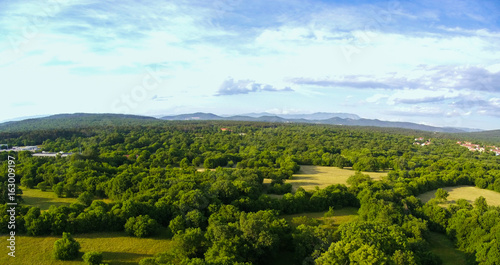 Принти на полотні Aerial view of green fields on karst . Trieste Italy